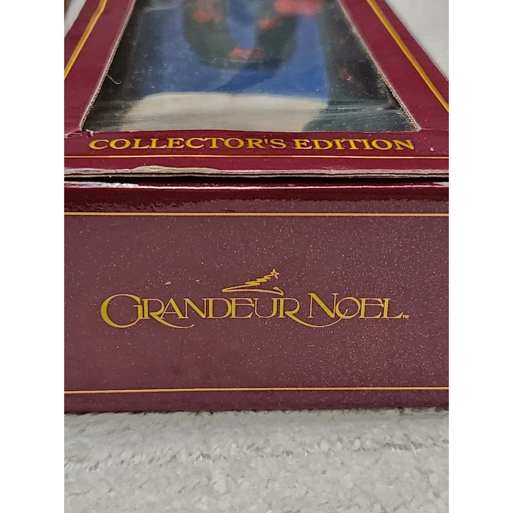Grandeur Noel Collectors Edition Carved Wood Santa of the World Figures Set Of 2
